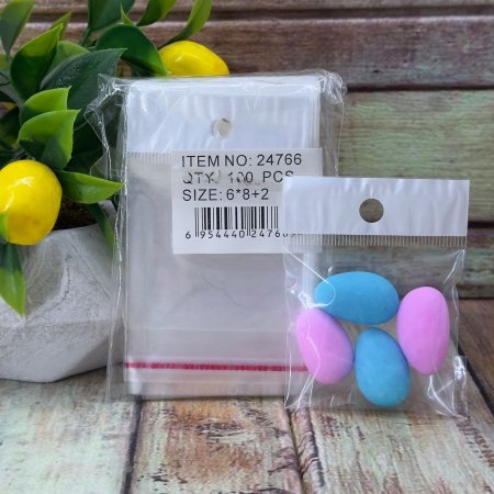 مجموعة (100كيس) تغليف شفاف مع تعليقة وشريط لاصق حجم 6*8 سم